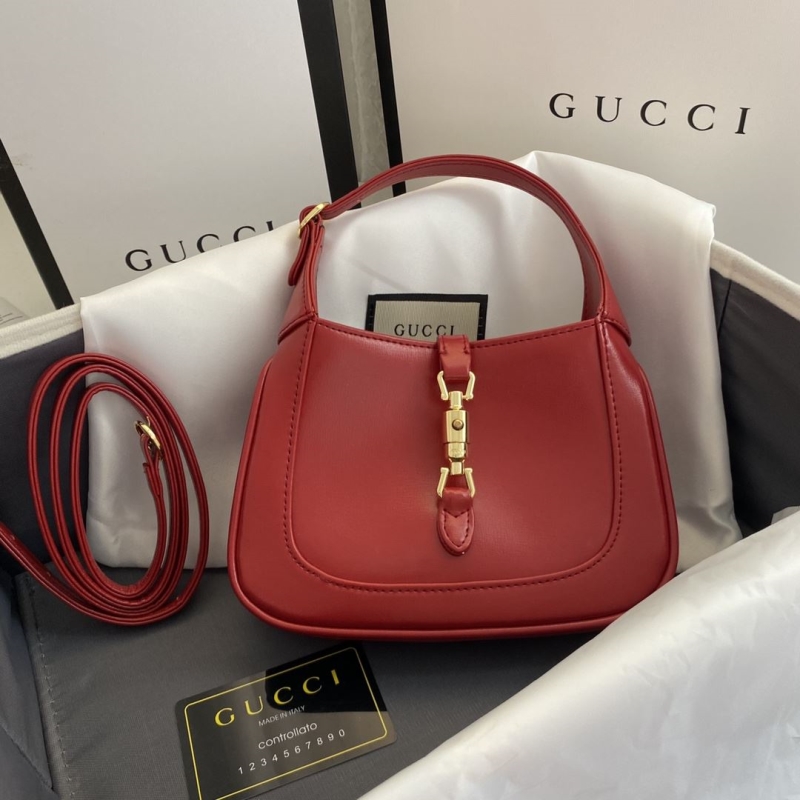 G*u*i top handle bags